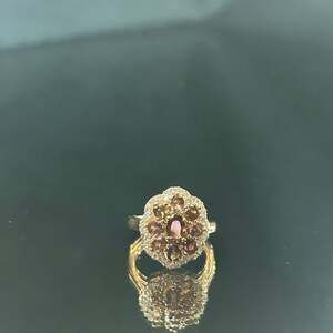 Beautiful color change garnet and moissanite imperial bloom ring